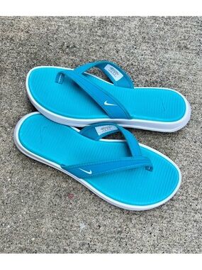 WMNS NIKE ULTRA CELSO
THONG LIGHT BLUES OCEANS WHITE SWOOSH FLIPS FLOPS